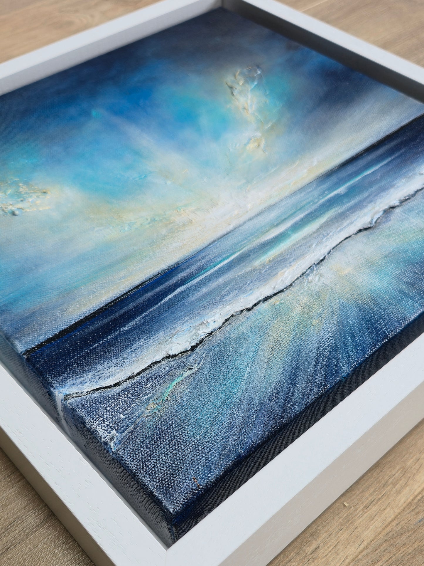 Framed coastal artwork