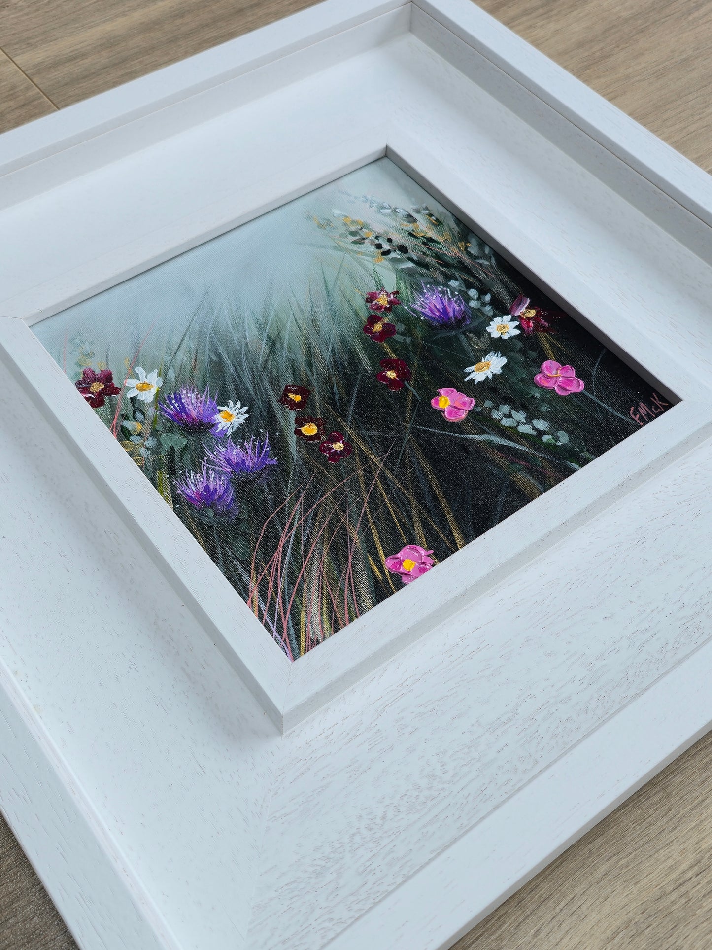 Framed artwork of flowers