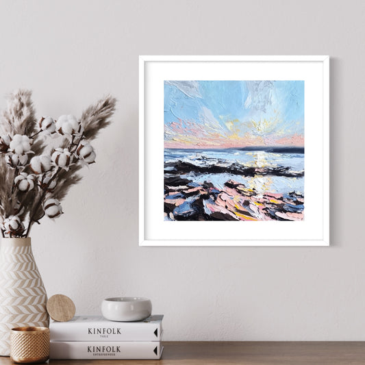 An original oil painting capturing the colours of a sunset sky along the coast