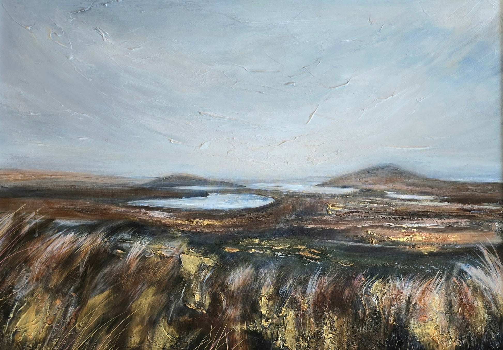 Painting of a landscape with a lake and mountains