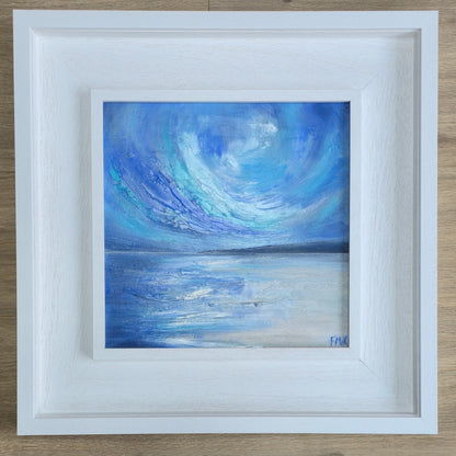 Framed coastal painting