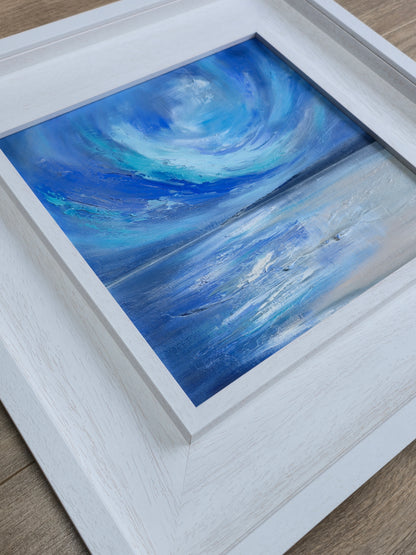 Framed coastal painting