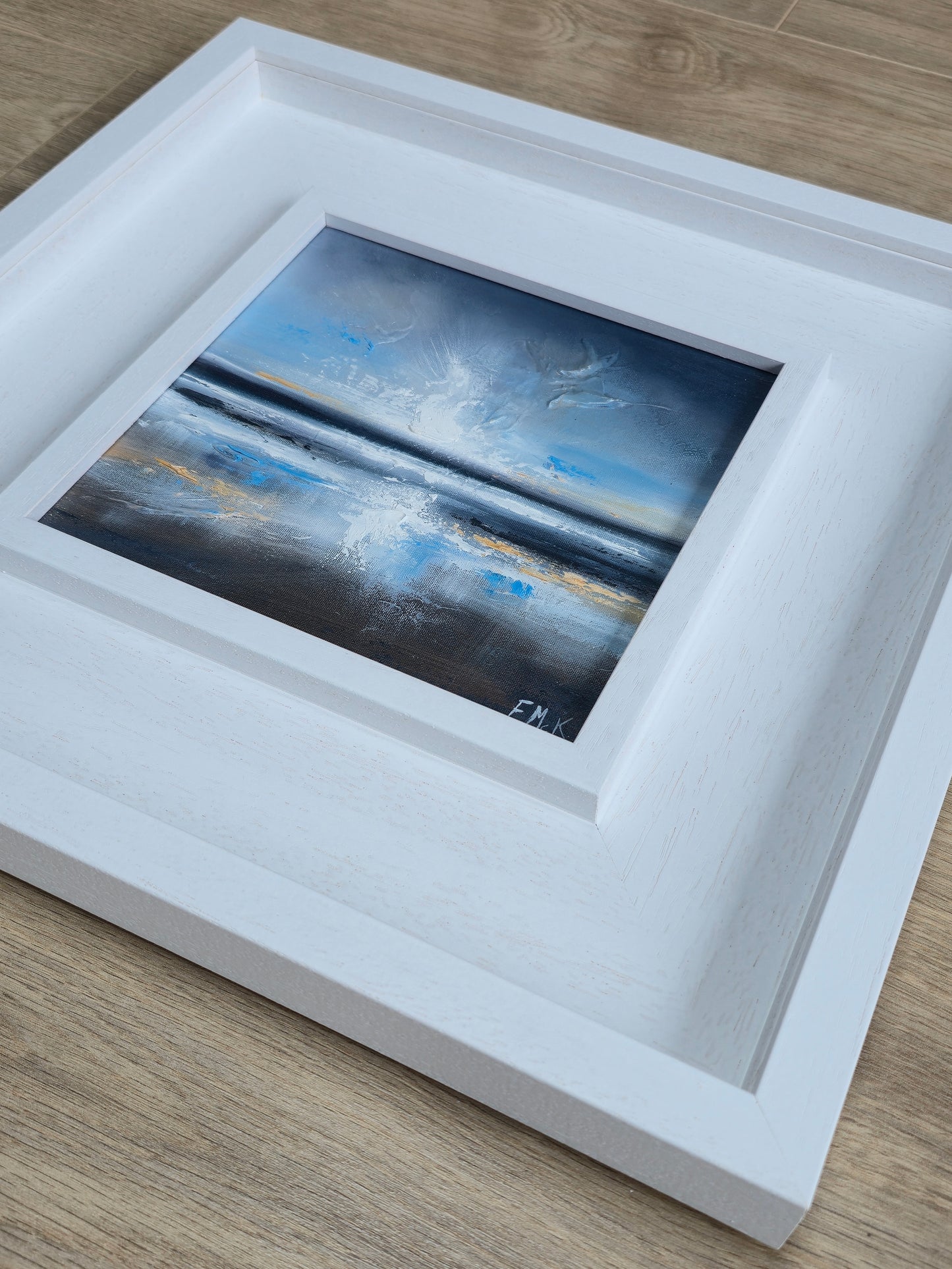 Framed coastal art