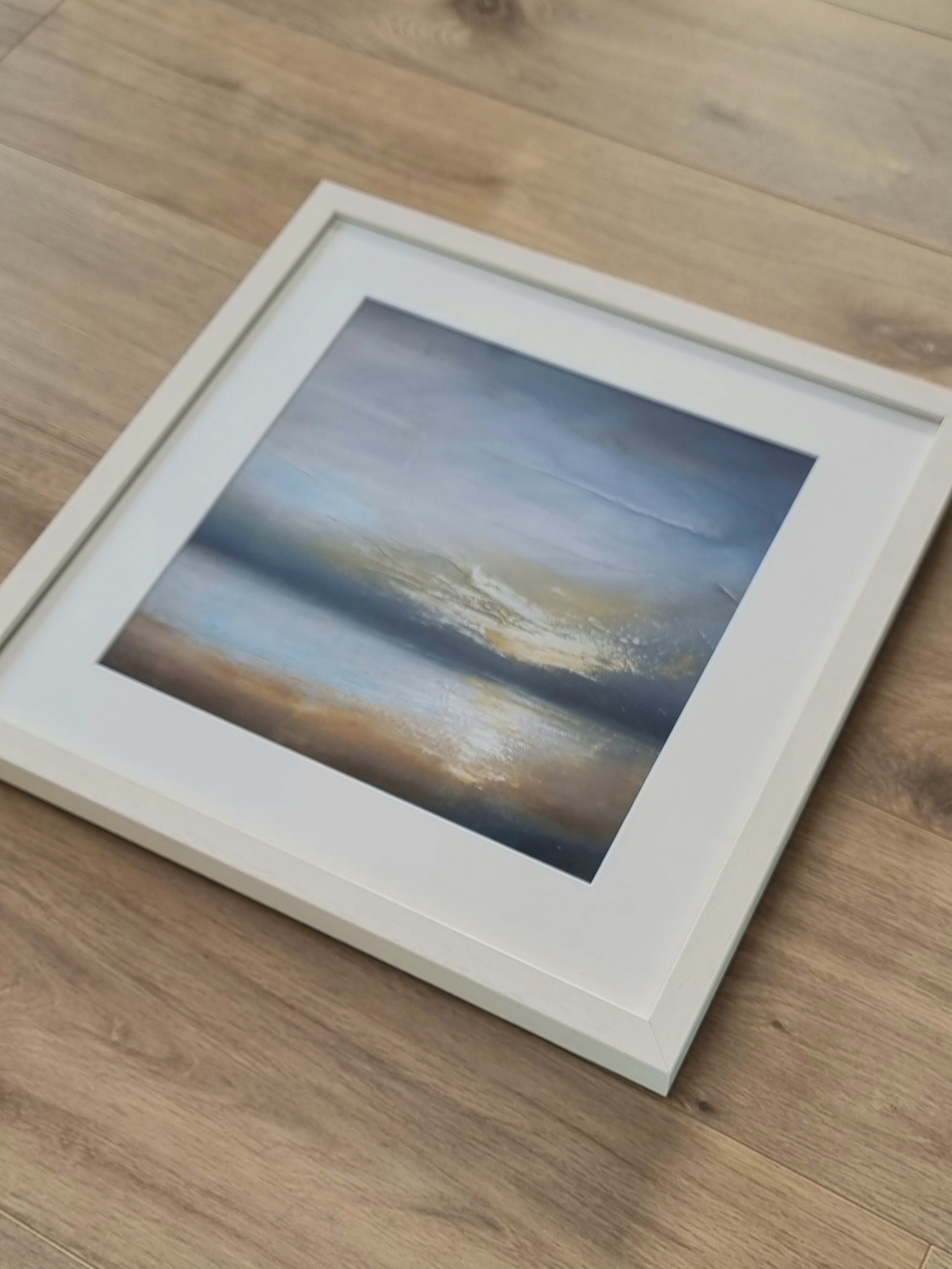 Moody beach framed print