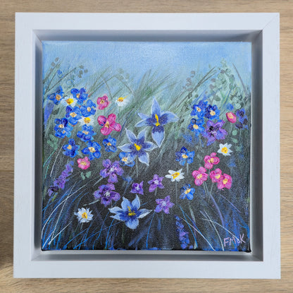 Framed painting of colourful flowers