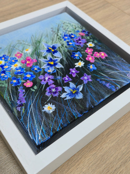 Framed artwork of wildflowers