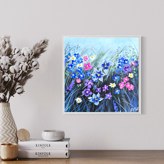 Framed floral painting on a wall