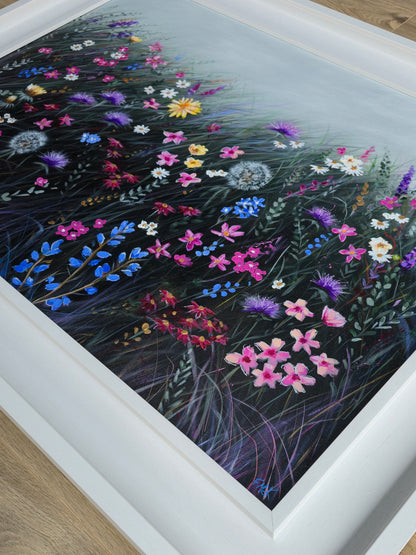 Framed artwork of colourful flowers