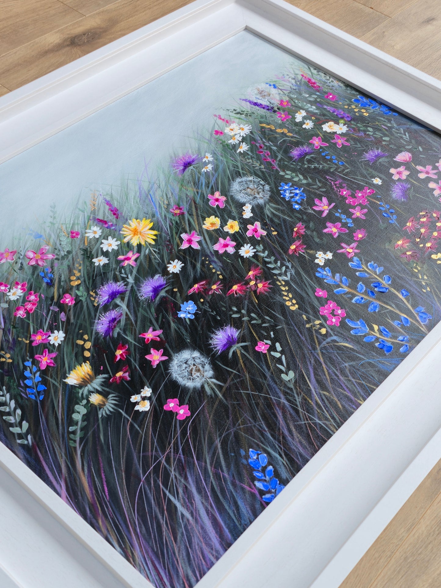 Framed artwork of colourful flowers
