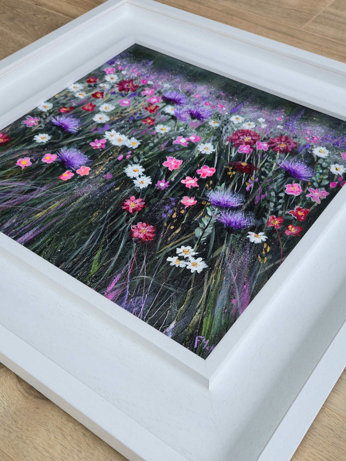 Framed artwork of a colourful field of flowers