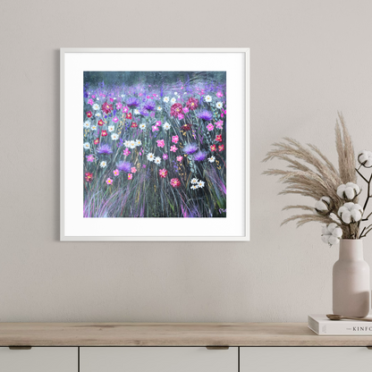Framed artwork of a colourful floral painting on a wall