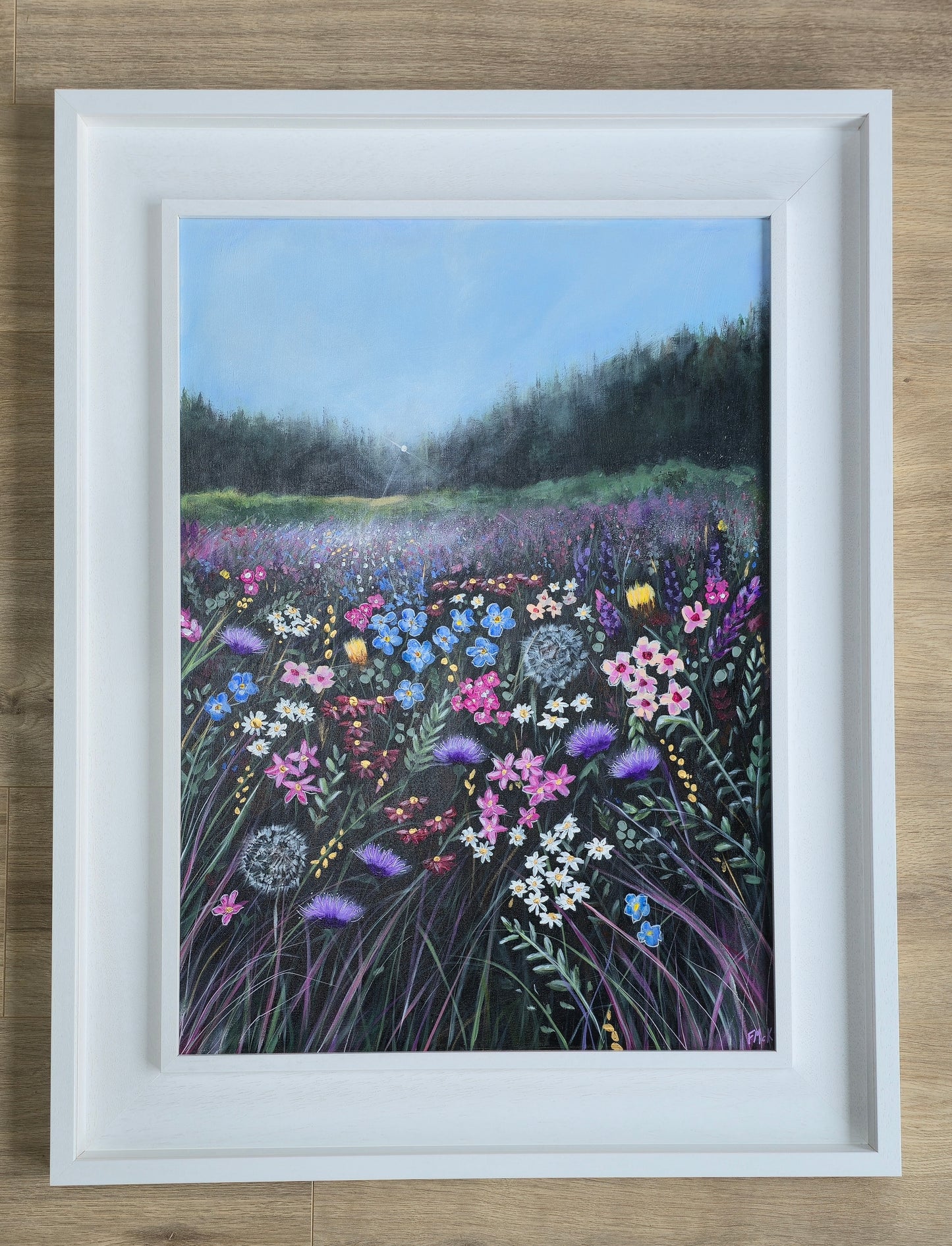 Framed artwork of a colourful field of flowers