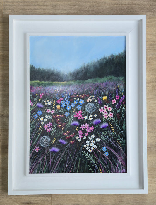 Framed artwork of a colourful field of flowers