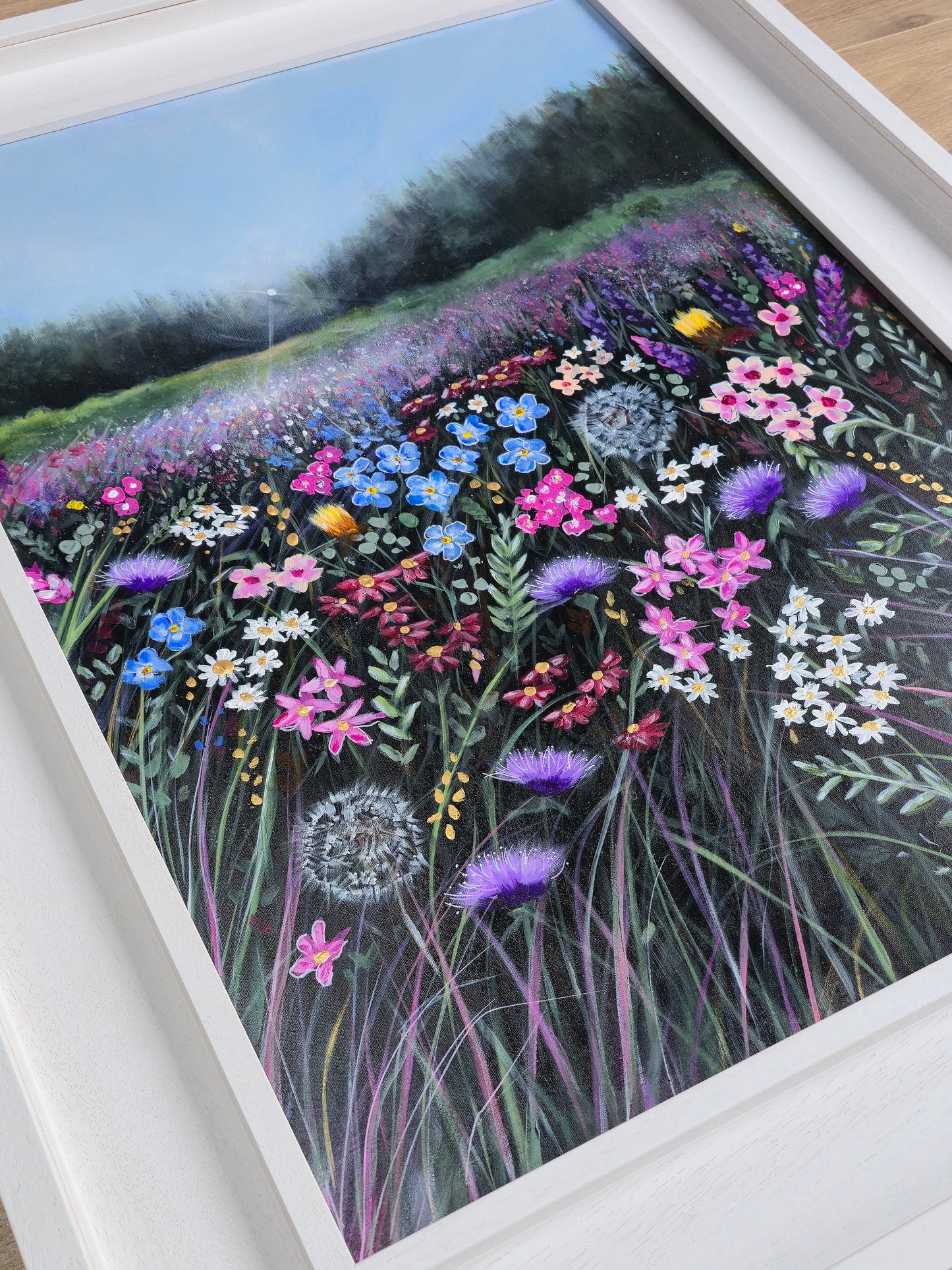 Framed artwork of a colourful field of flowers
