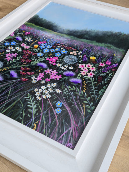 Framed artwork of a field of wildflowers
