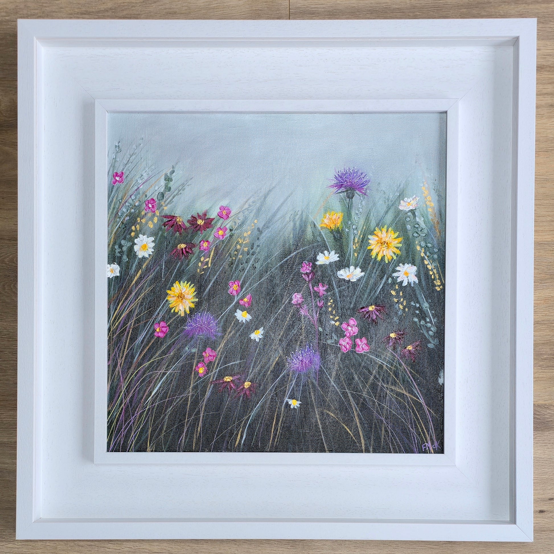 Framed artwork of wildflowers