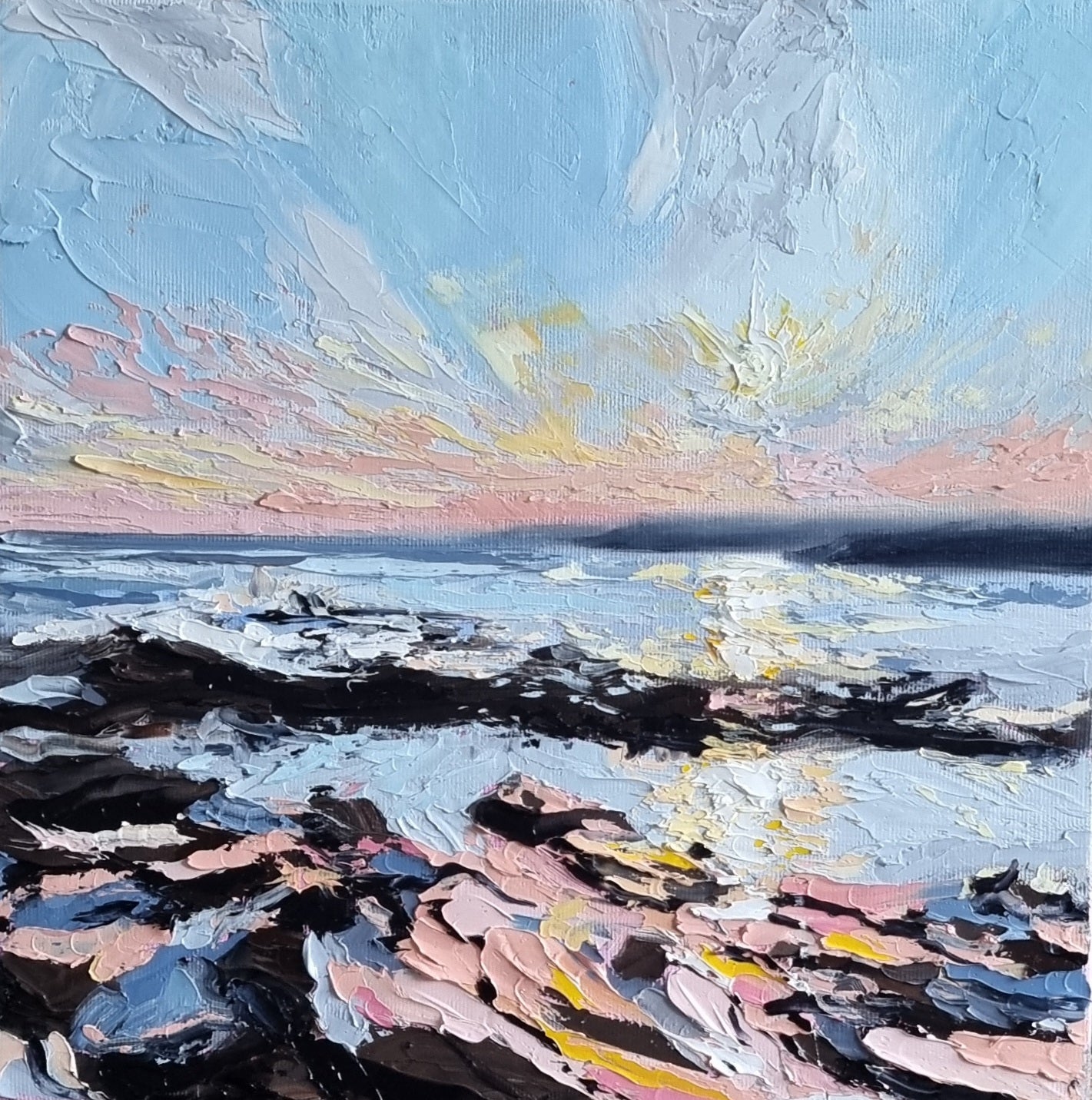 An original oil painting capturing the colours of a sunset sky along the coast